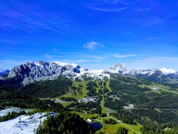 Scenic view of mountains against sky during winter