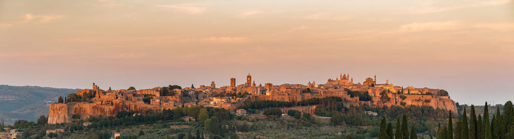 View of buildings at sunset