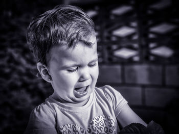 Close-up portrait of girl looking away