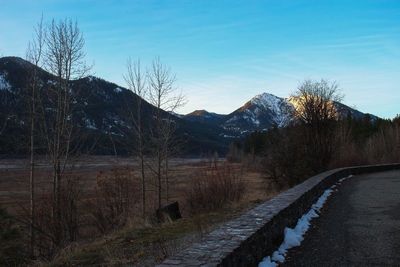 Scenic view of snowcapped mountains against sky during winter