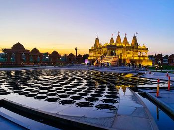 Panoramic view of temple building against sky during sunset