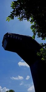 Low angle view of silhouette tree against sky