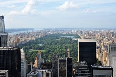 High angle view of buildings in city against sky