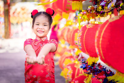 Portrait of smiling girl wearing traditional clothing