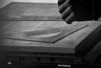 High angle view of man working on table