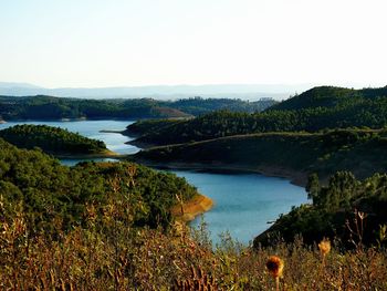 Scenic view of lake against clear sky