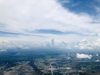 Aerial view of city against sky