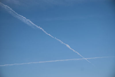 Low angle view of vapor trail in sky