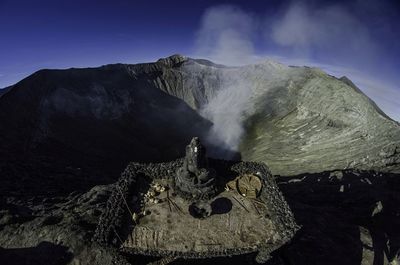 Ganesha statue against mountains