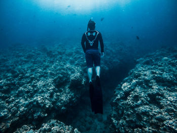 Man swimming in sea