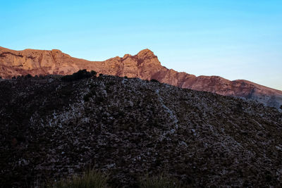 Scenic view of mountains against clear sky