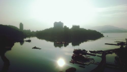 Scenic view of calm lake at sunset