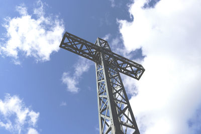 Low angle view of metal structure against sky