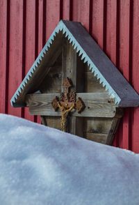 Almost snowed crucifix in bavarian forest