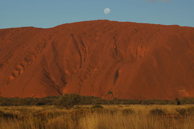 Scenic view of desert against clear sky