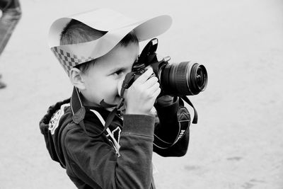 Man photographing through camera