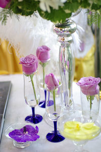 Close-up of flowers in glass vase on table wedding decoration