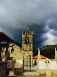 Building against cloudy sky