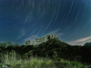 Scenic view of star field against sky at night