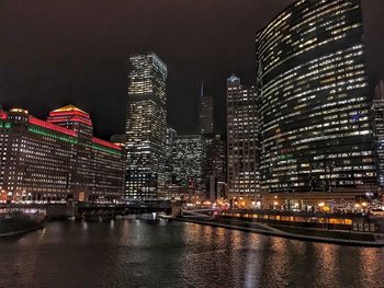 Low angle view of illuminated city at night