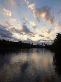 Scenic view of lake against sky during sunset