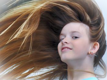 Close-up portrait of smiling girl