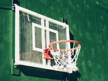 Close-up of basketball hoop on wall