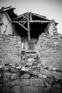 Abandoned building against sky