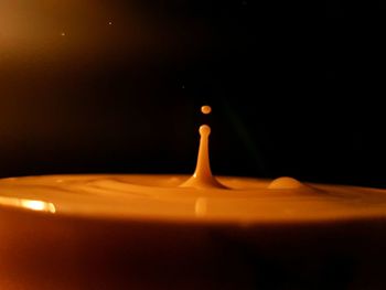 Close-up of water drops against black background