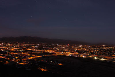 Aerial view of cityscape at night