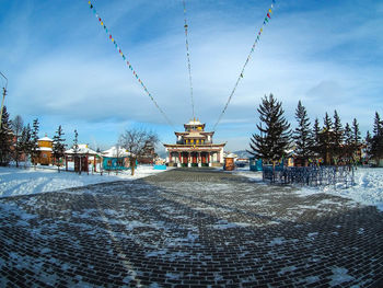 Built structure against cloudy sky