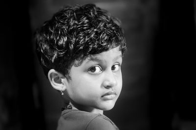 Close-up of boy looking away