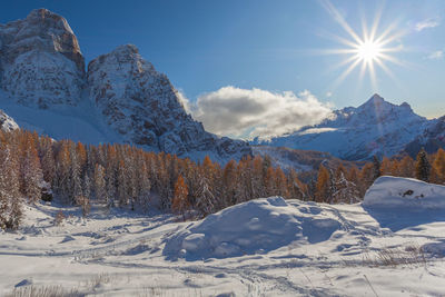 Awesome mount pelmo and mount civetta northern side winter panorama in a sunny day, dolomites, italy