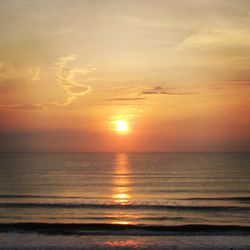 View of calm sea at sunset