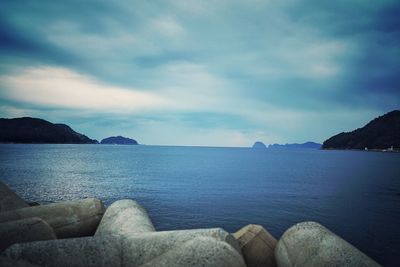 Scenic view of sea against dramatic sky