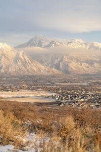 Scenic view of snowcapped mountains against sky