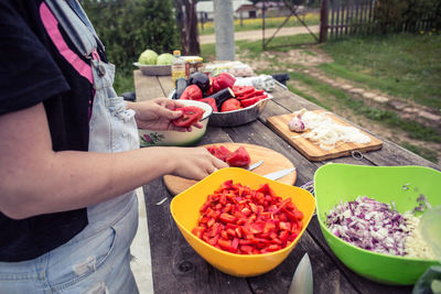 Midsection of woman having food