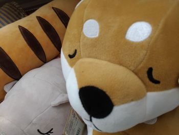 Close-up of stuffed toy on bed