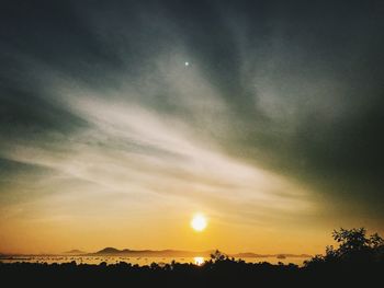 Scenic view of dramatic sky during sunset