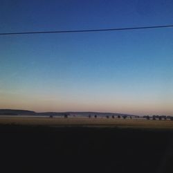 Scenic view of calm sea at sunset