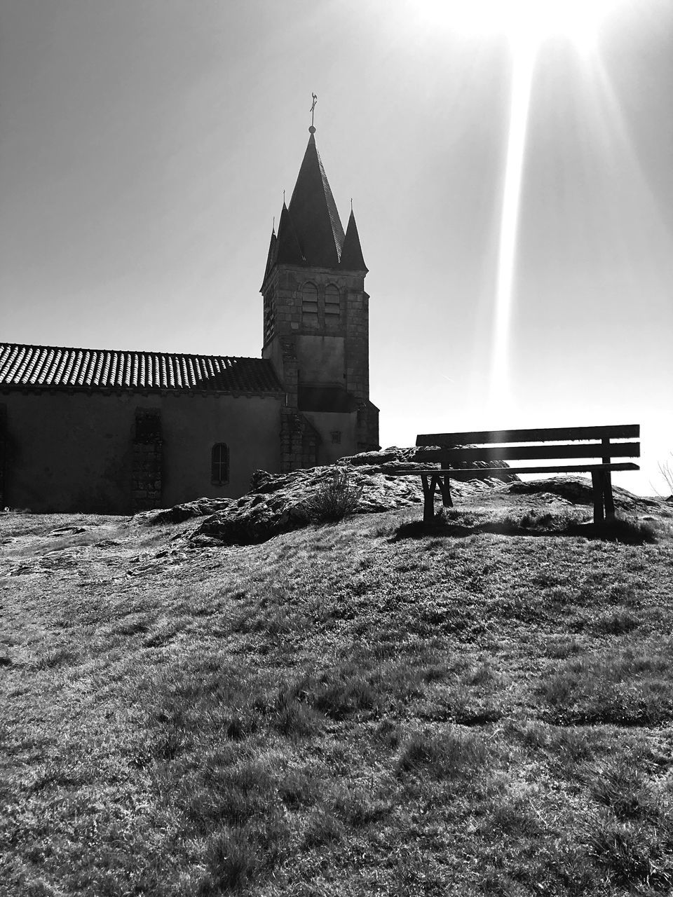 architecture, built structure, sky, nature, building exterior, black and white, monochrome, monochrome photography, religion, building, white, place of worship, sunlight, belief, spirituality, history, no people, travel destinations, the past, day, tower, outdoors, darkness, land, landscape, light, environment, black, travel, water