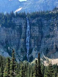 Crypte lake waterfall in the waterton national park  alberta canada.  on a 18km hike back and forth. 