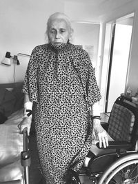 Senior woman walking at home