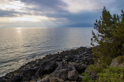 Scenic view of sea against sky during sunset