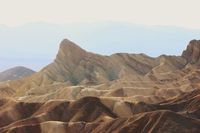 Scenic view of rocky mountains against sky