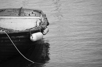 Information sign on moored ferry in river