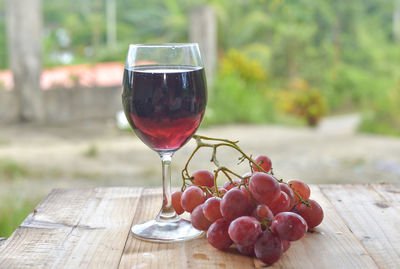 Close-up of wineglass on table