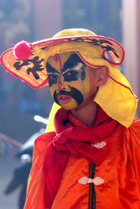 Close-up of boy wearing carnival costume