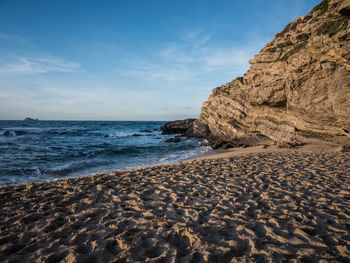 Scenic view of beach against sky