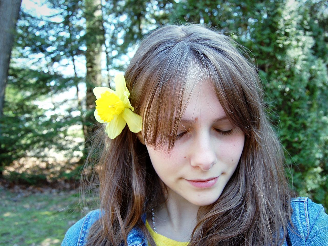 one person, childhood, outdoors, front view, day, girls, flower, yellow, close-up, headshot, tree, real people, nature, people